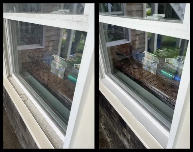 Technician using professional tools to clean interior glass