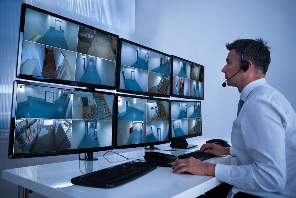 security-guard-monitoring-screens
