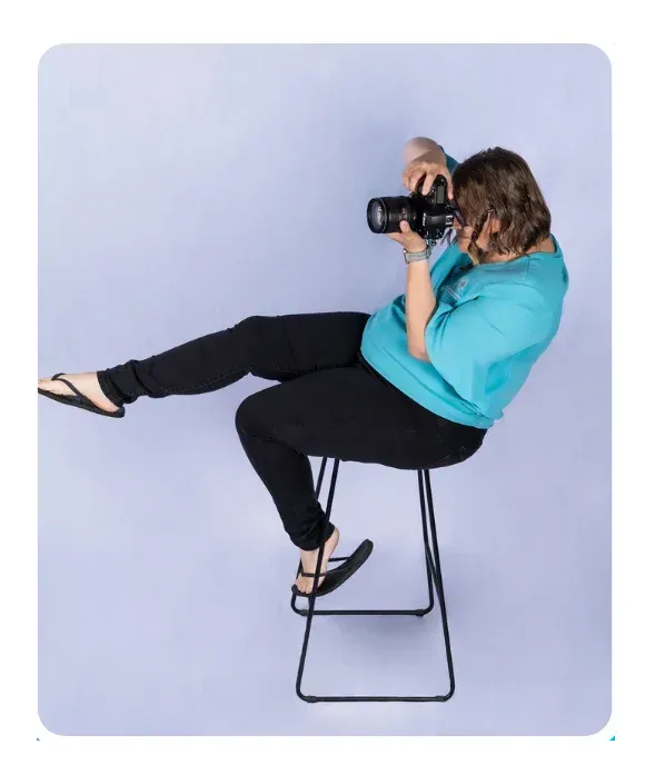 Ellie Clare from CLP Advertising capturing creative brand imagery in a studio for a client’s marketing campaign.