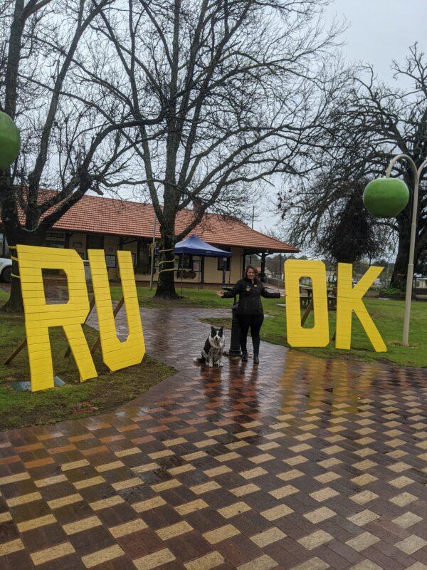 Photo of Ellie Clare owner of CLP Advertising & Photography Service, with the CLP CEO Monty, the driving force behind her passion for mental health and wellbeing.