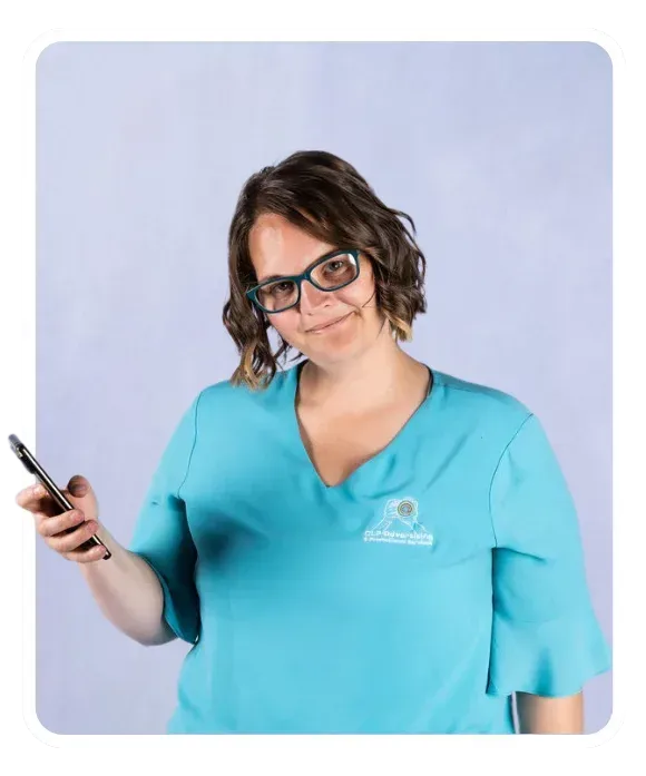 Photo of Ellie Clare with her phone popin gout of the frame, scrolling through her case studies completed by CLP Advertising