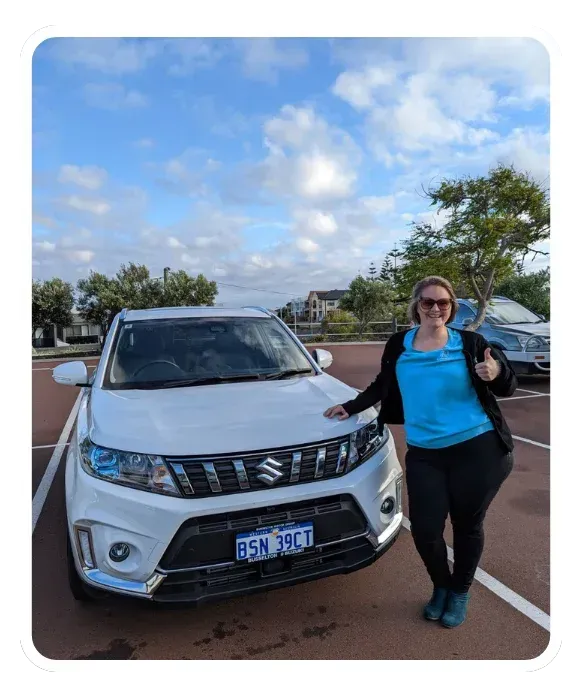 Ellie Clare from CLP Advertising standing beside her branded work car in regional Western Australia.