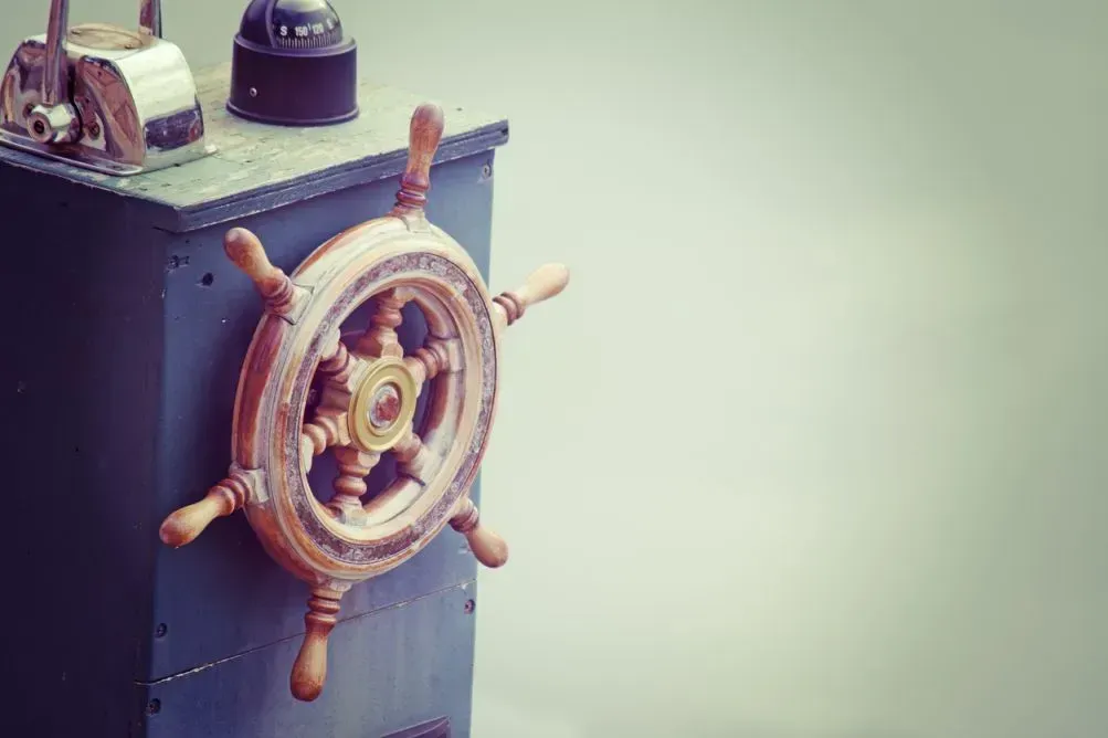 A vintage ship's helm replica