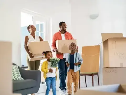 Family moving in with the help of Wentworth Moving Services