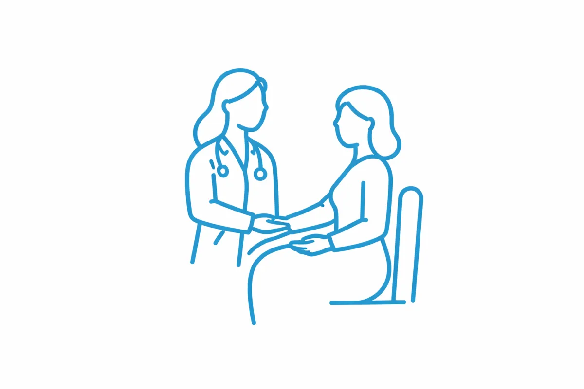 A medical professional assists a woman during labor.