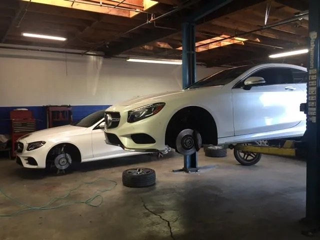 woman placing sticky notes on wall