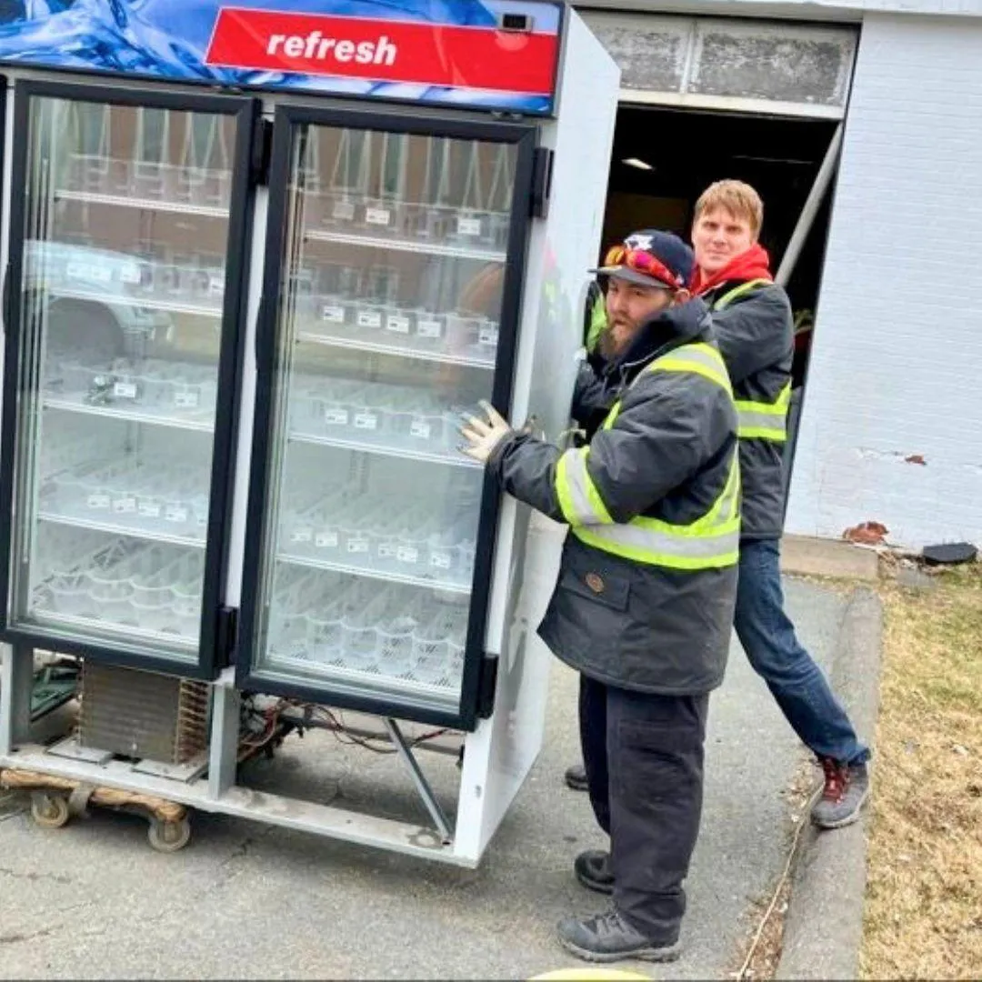 Heritage Movers team expertly relocating commercial and business equipment, ensuring a seamless move for offices and businesses in Nova Scotia and Atlantic Canada.