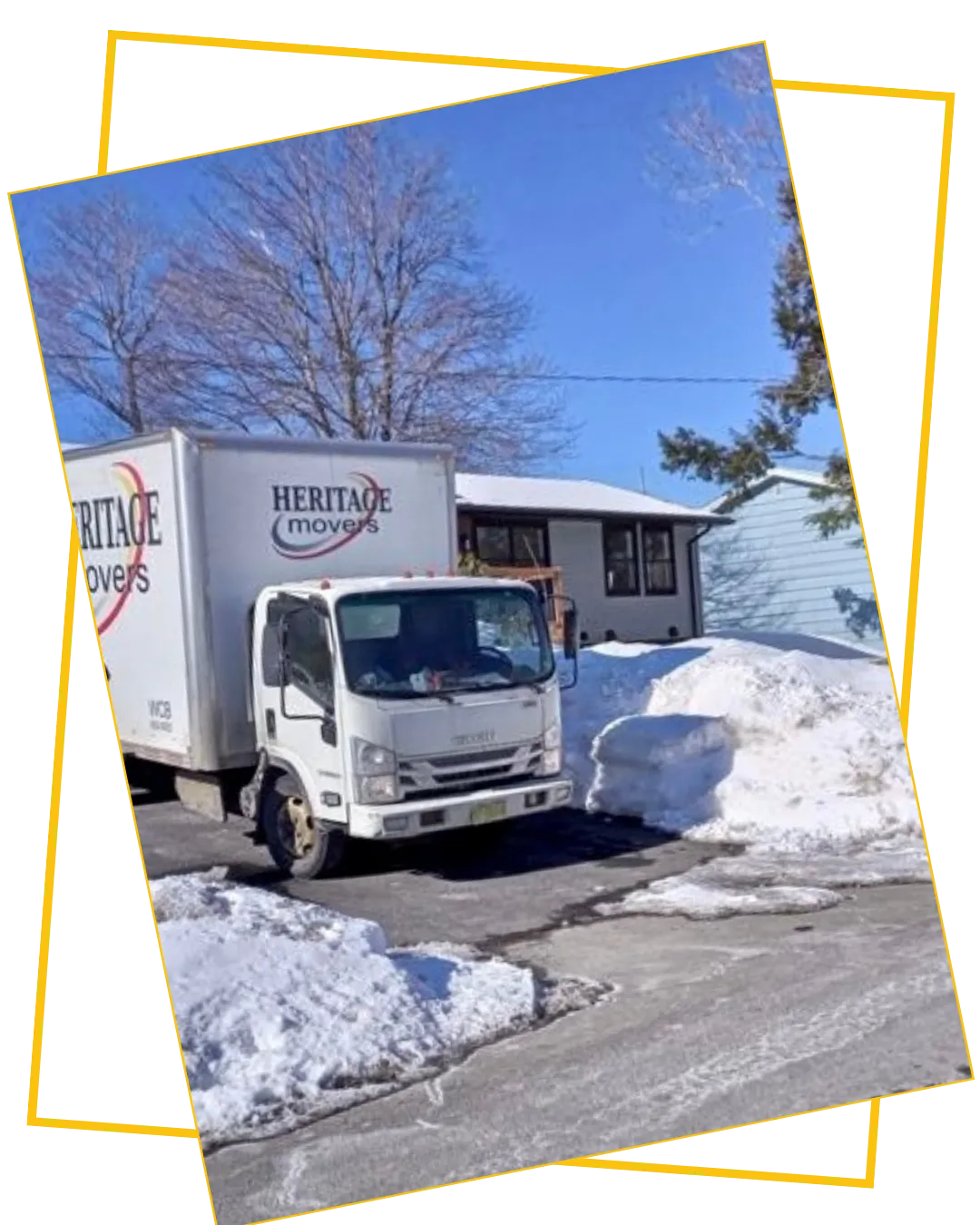 Heritage Movers truck parked outside a home, delivering reliable and transparent residential moving services across Prince Edward Island and Atlantic Canada.