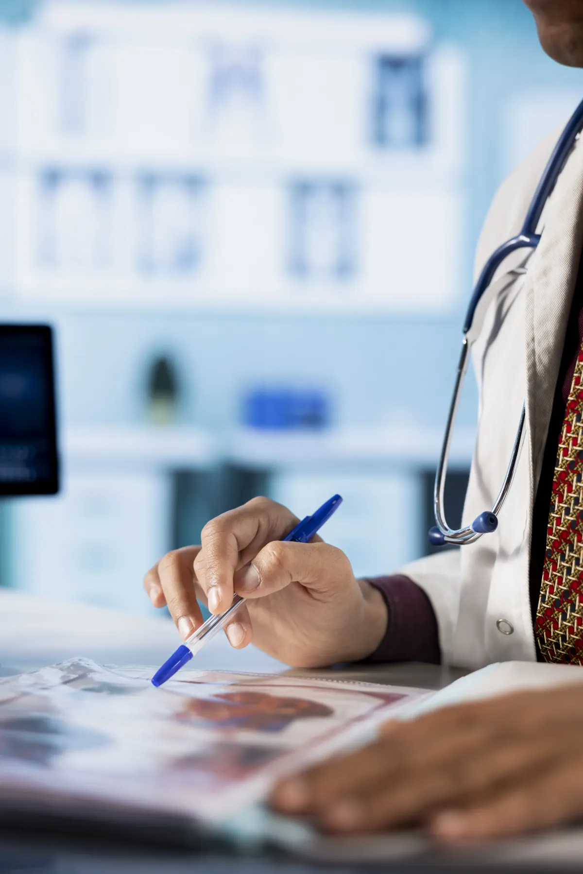 african american nurse takes notes consultation with obese patients