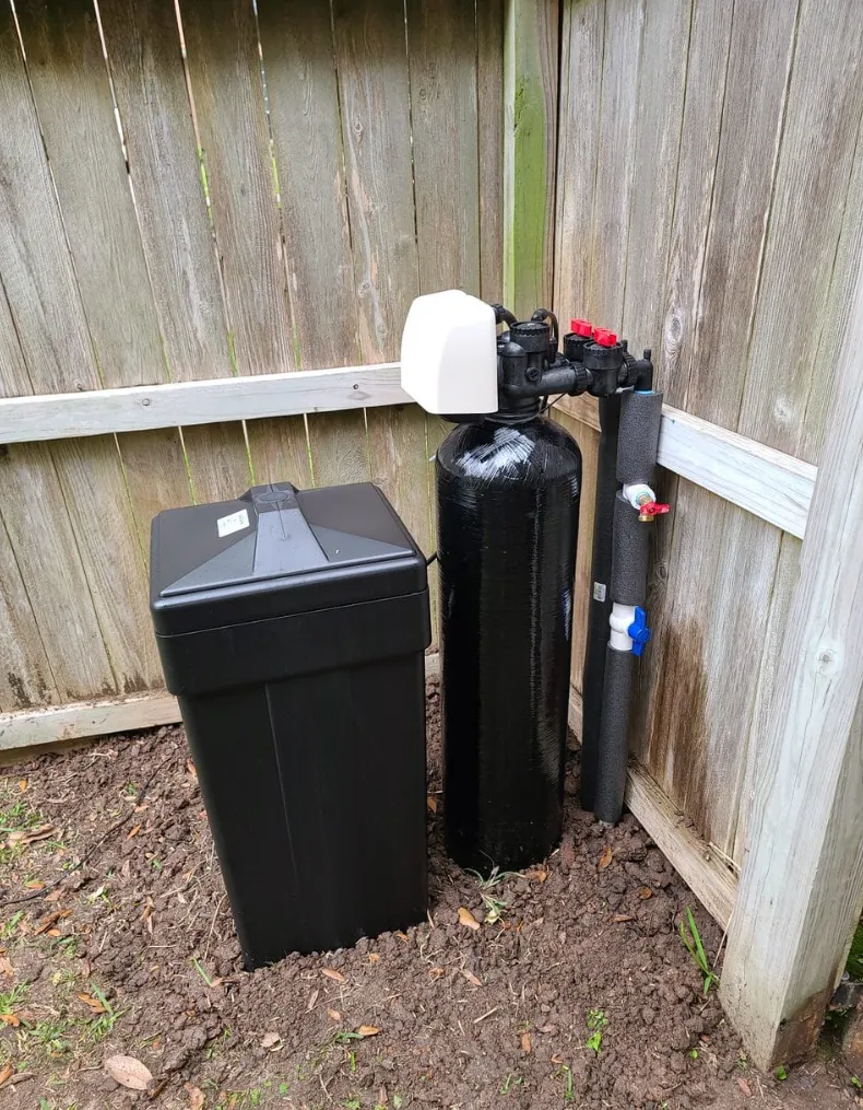 Synthetic turf being installed by Mundo Landscaping in Tucson, AZ — durable, low-maintenance artificial grass solution.