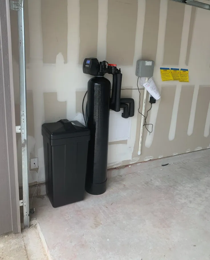 Synthetic turf being installed by Mundo Landscaping in Tucson, AZ — durable, low-maintenance artificial grass solution.