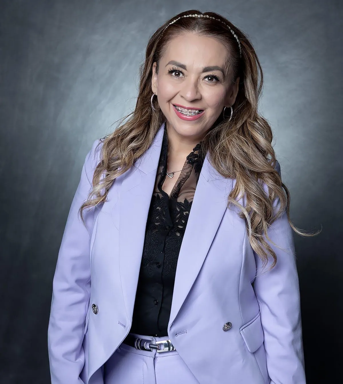 man wearing watch with black suit