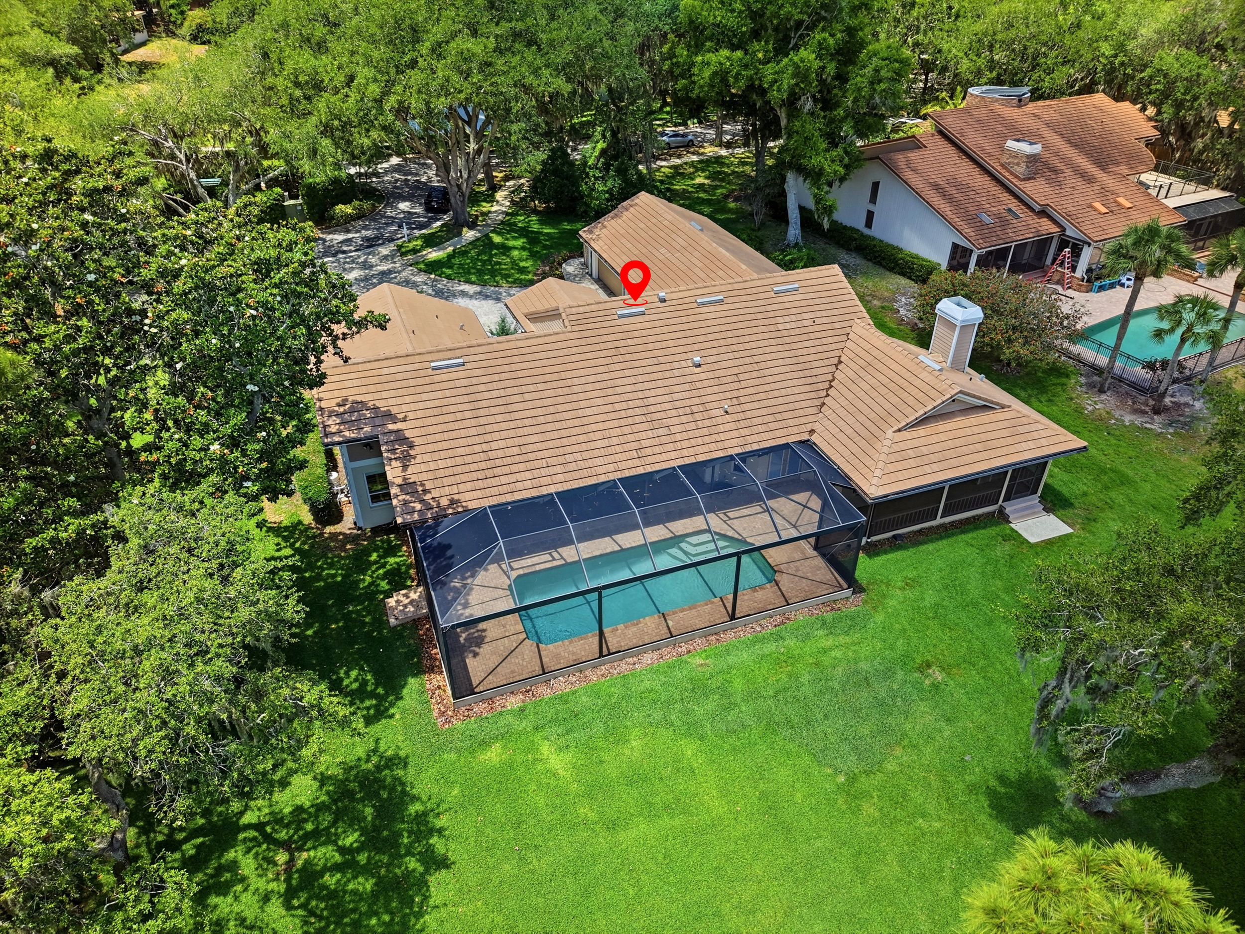 3493 Shoreline Cir Lake Tarpon Waterfront Pool Home For Sale Palm Harbor, FL