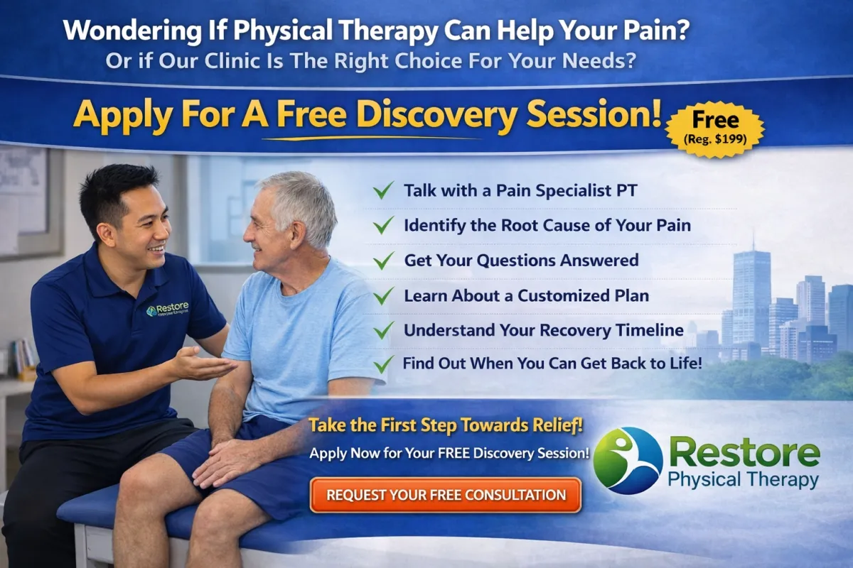 Physical therapist from Restore Physical Therapy discussing a treatment plan with a patient seated on a therapy table during a free discovery session.