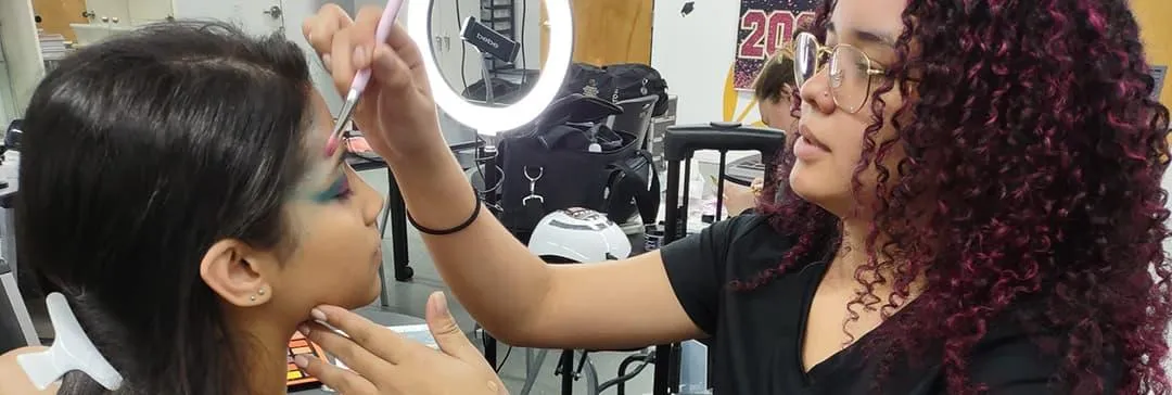 Cosmetology Student in a makeup competition in Orlando at Hyphen Beauty School