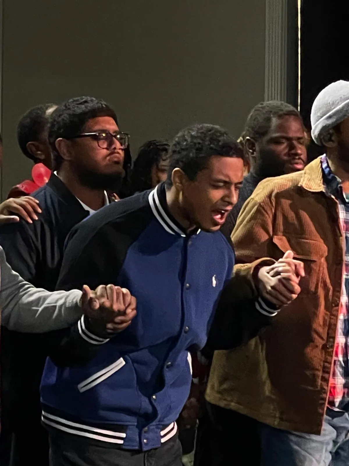 four women looking down