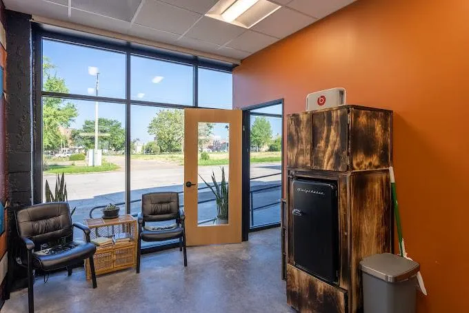 woman in blue long sleeve shirt with white face mask