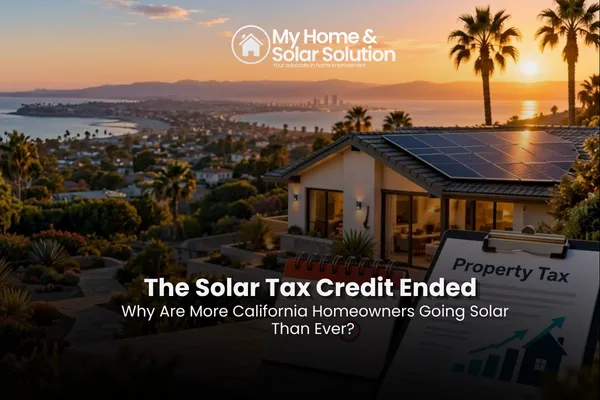 A California homeowner reviewing an electric bill at the kitchen table with rooftop solar panels visible through the window.
