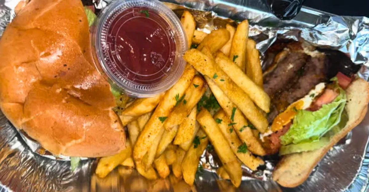 Old fashioned double bacon cheeseburger with seasoned fries from Nate’s Plates in Midland TX.
