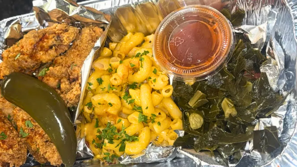 Fried chicken plate with mac and cheese and collard greens from Nate’s Plates in Midland Texas.