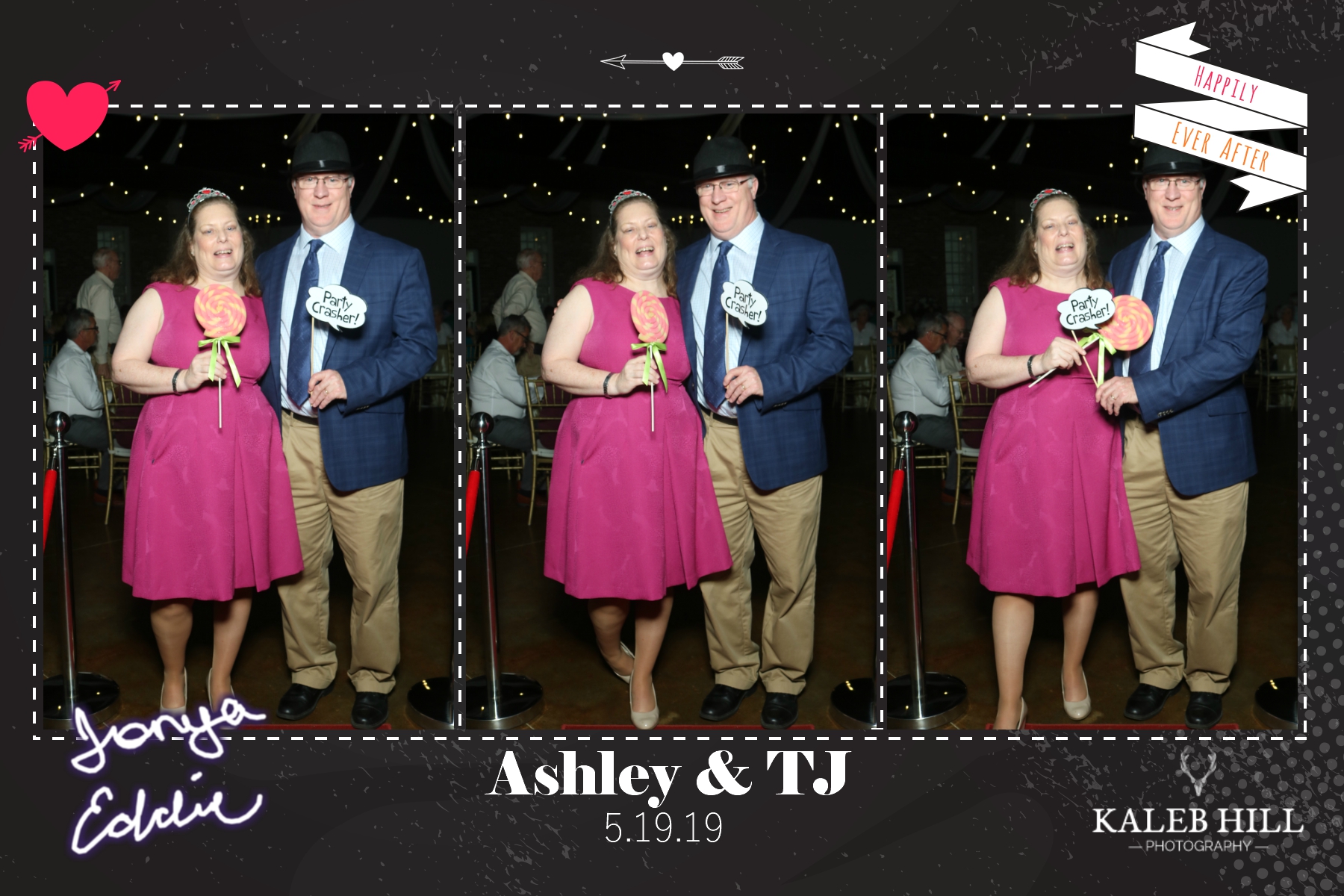 Wedding guests in colorful formal attire posing with fun props at indoor reception photo booth