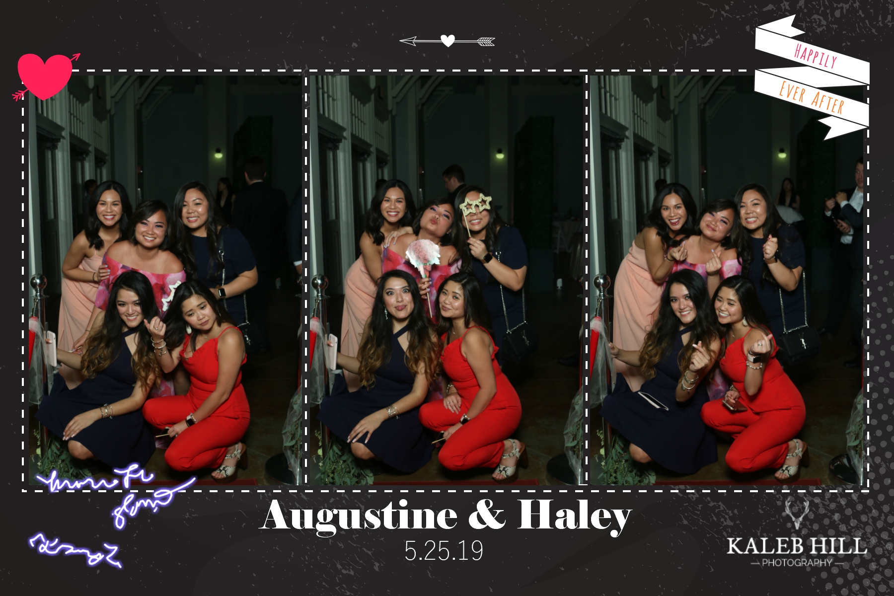 Group of wedding guests in colorful dresses posing together at lively wedding reception photo booth