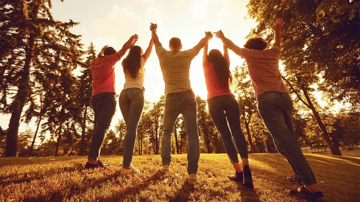 blue and multicolored map with punctured pins with paper strips