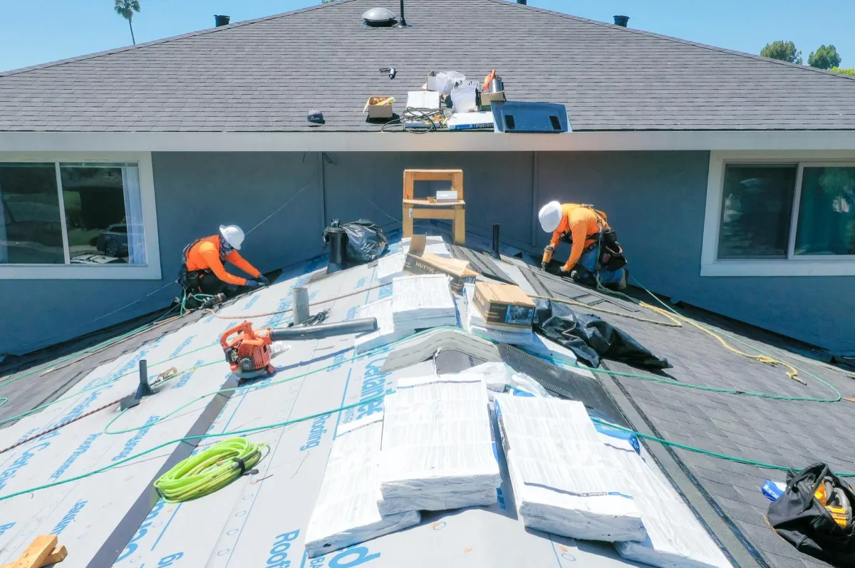 Residential roof inspection and maintenance with asphalt shingles on a single-family home in the Bay Area