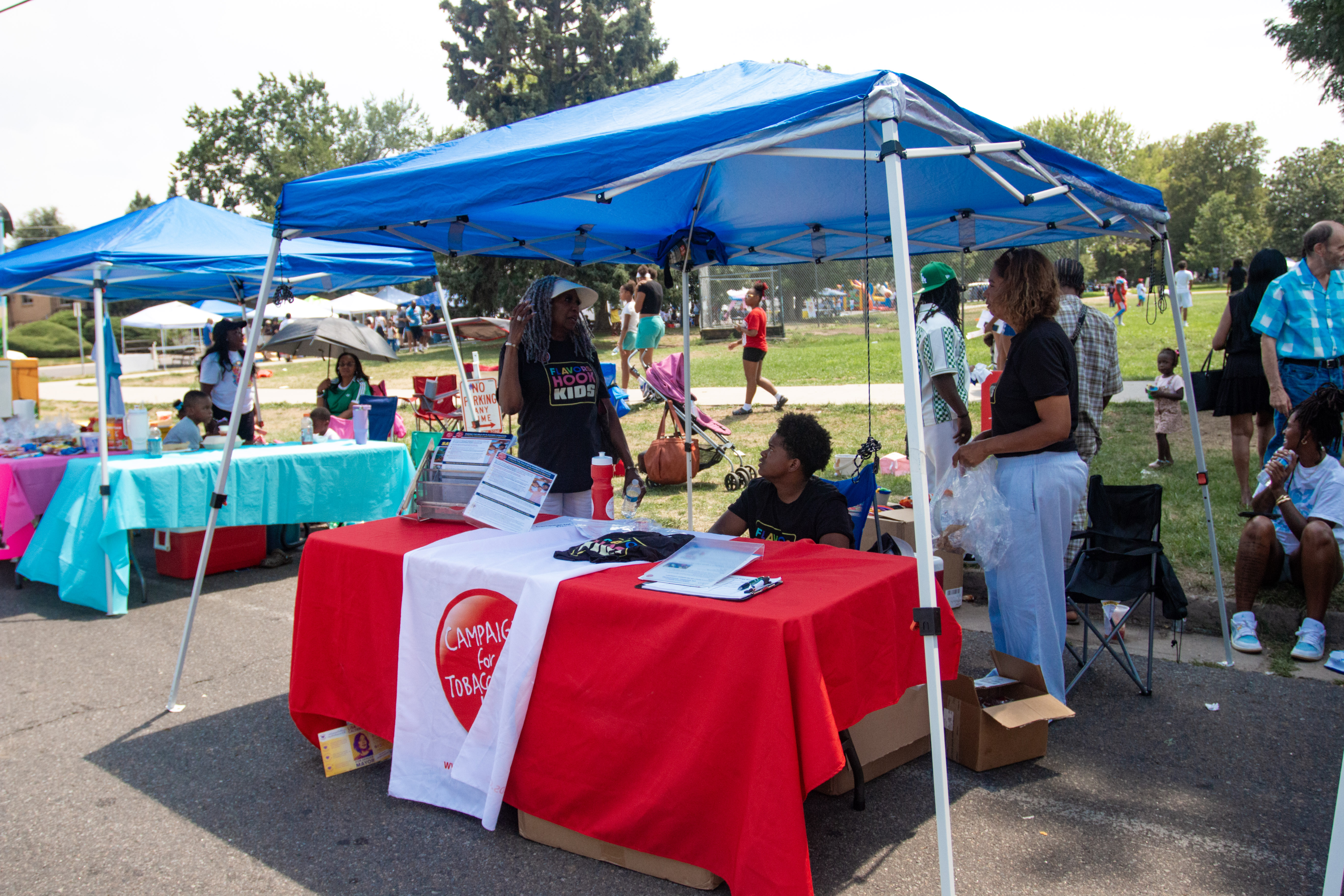 Real photography showing WDC community outreach and advocacy work