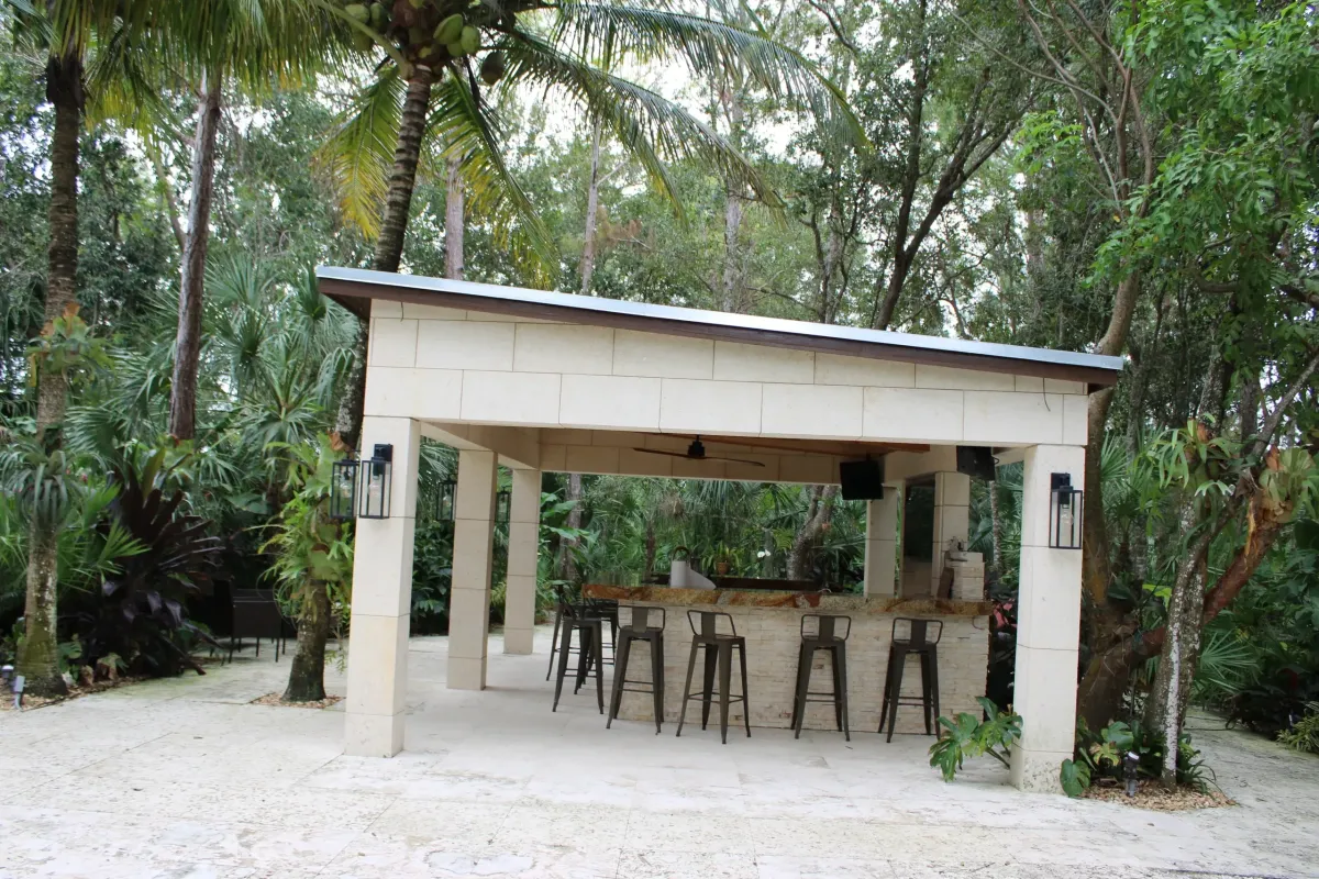 Blessings Miami night Peaceful coral stone waterfall and lagoon for beautiful natural weddings & events in Miami Florida.