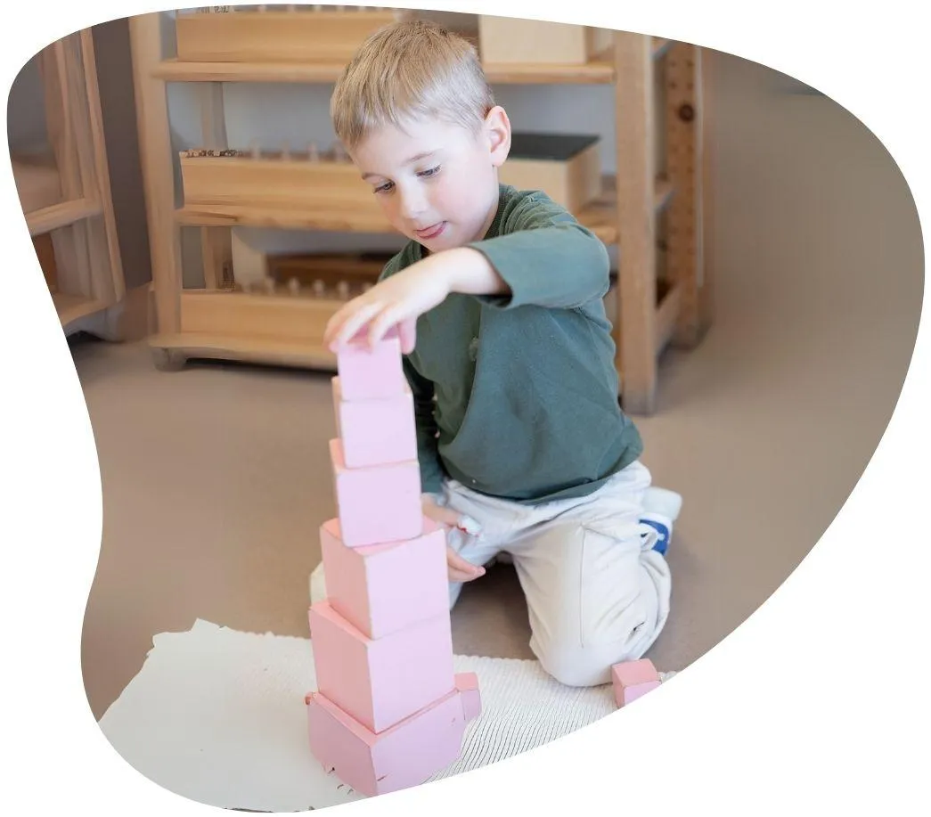 Child learning independently with Montessori materials at Casa Montessori & Orff School in Winnipeg
