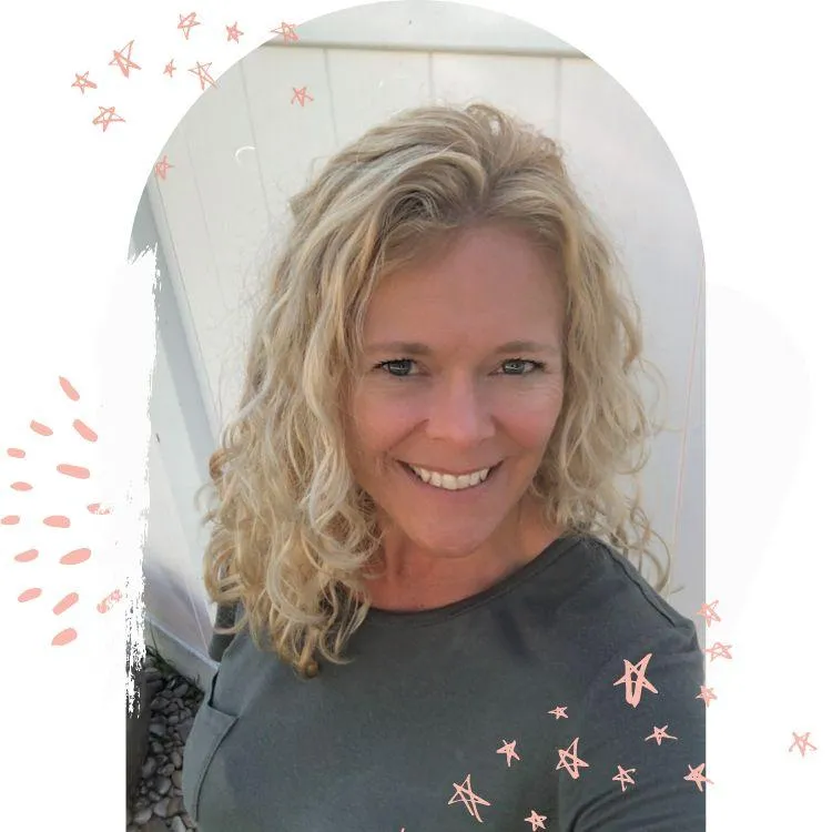 Yoga instructor, Jennifer with True to You Yoga, smiling, encouraging you in your yoga practice