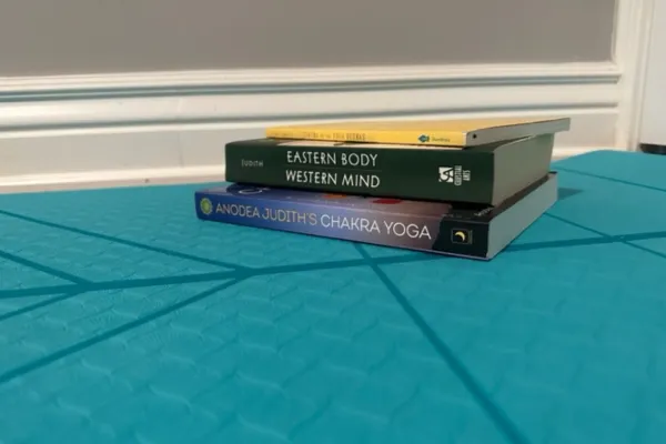 Yoga mat with books on it