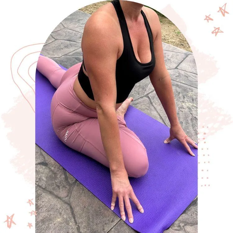 yoga instructor, Jennifer, in pigeon pose