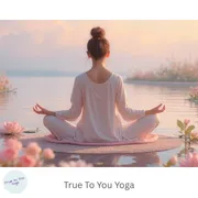 woman meditating looking over lake