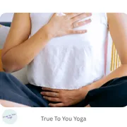 woman with one hand on heart and one hand on belly