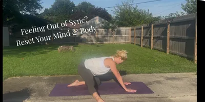 woman in yoga table pose with one leg extended