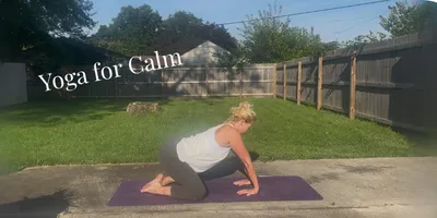 woman in yoga table pose stretching her wrists