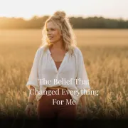 woman walking through field realizing she can break through from her old beliefs
