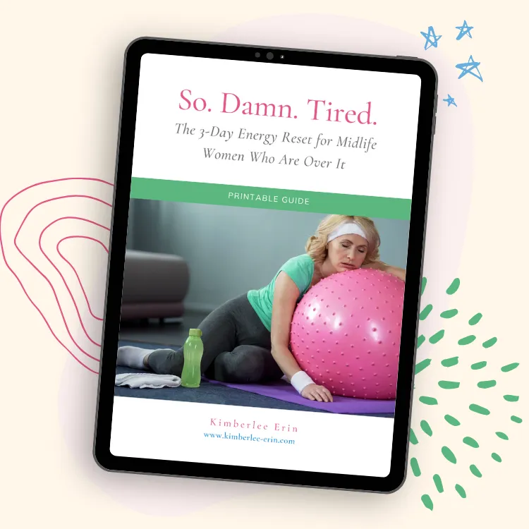 Midlife woman asleep on exercise ball looking exhausted from perimenopause fatigue