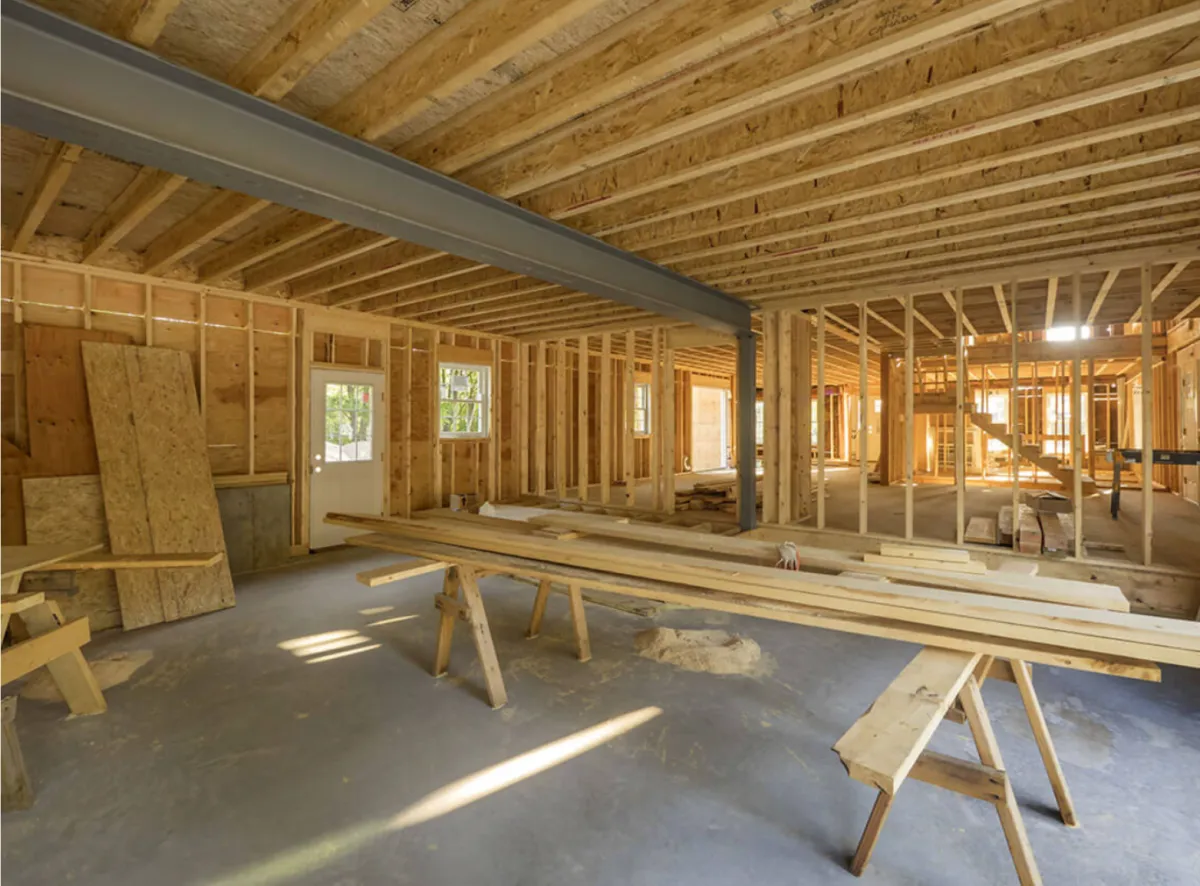 a photo displaying the wood structure of a building (room addition)
