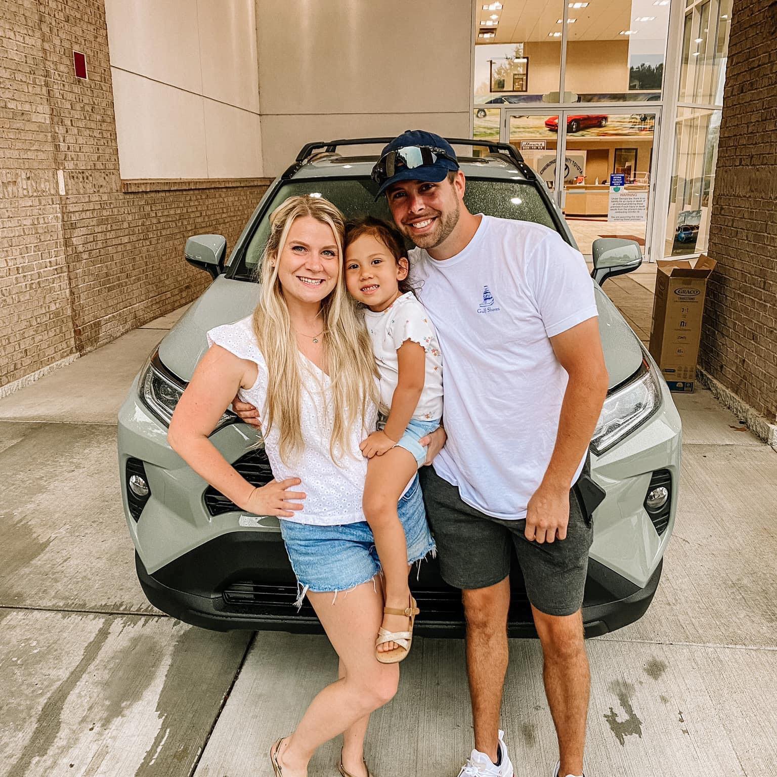 Reliable Custom Exteriors team members in front of local North Georgia homes and landmarks