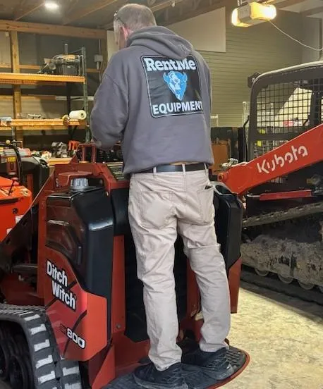 RentMe Equipment maintaining machinery to ensure reliable rentals in Cincinnati Ohio