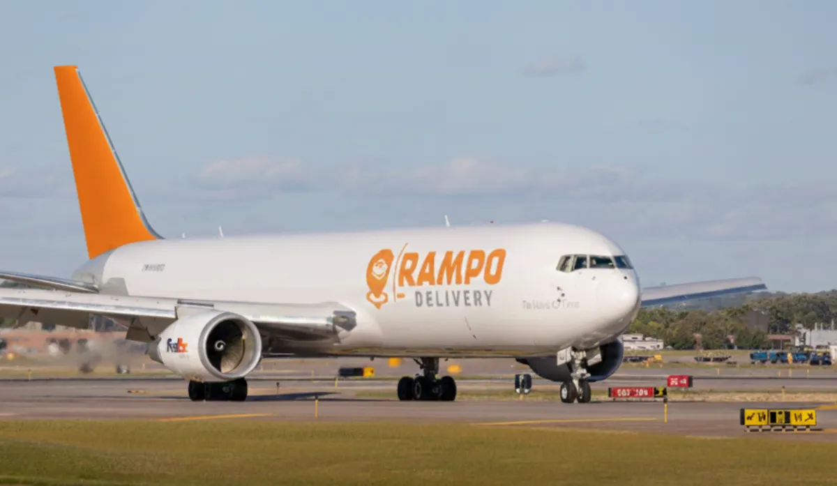 white and red passenger plane on airport during daytime