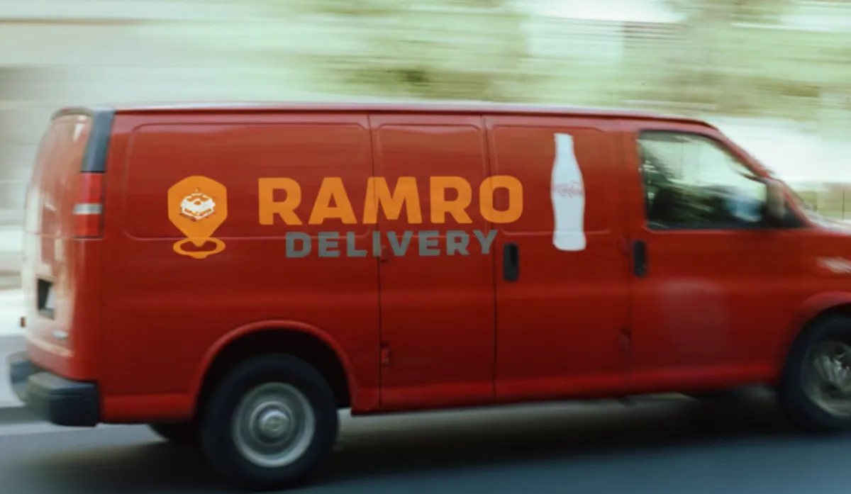 red van on road during daytime