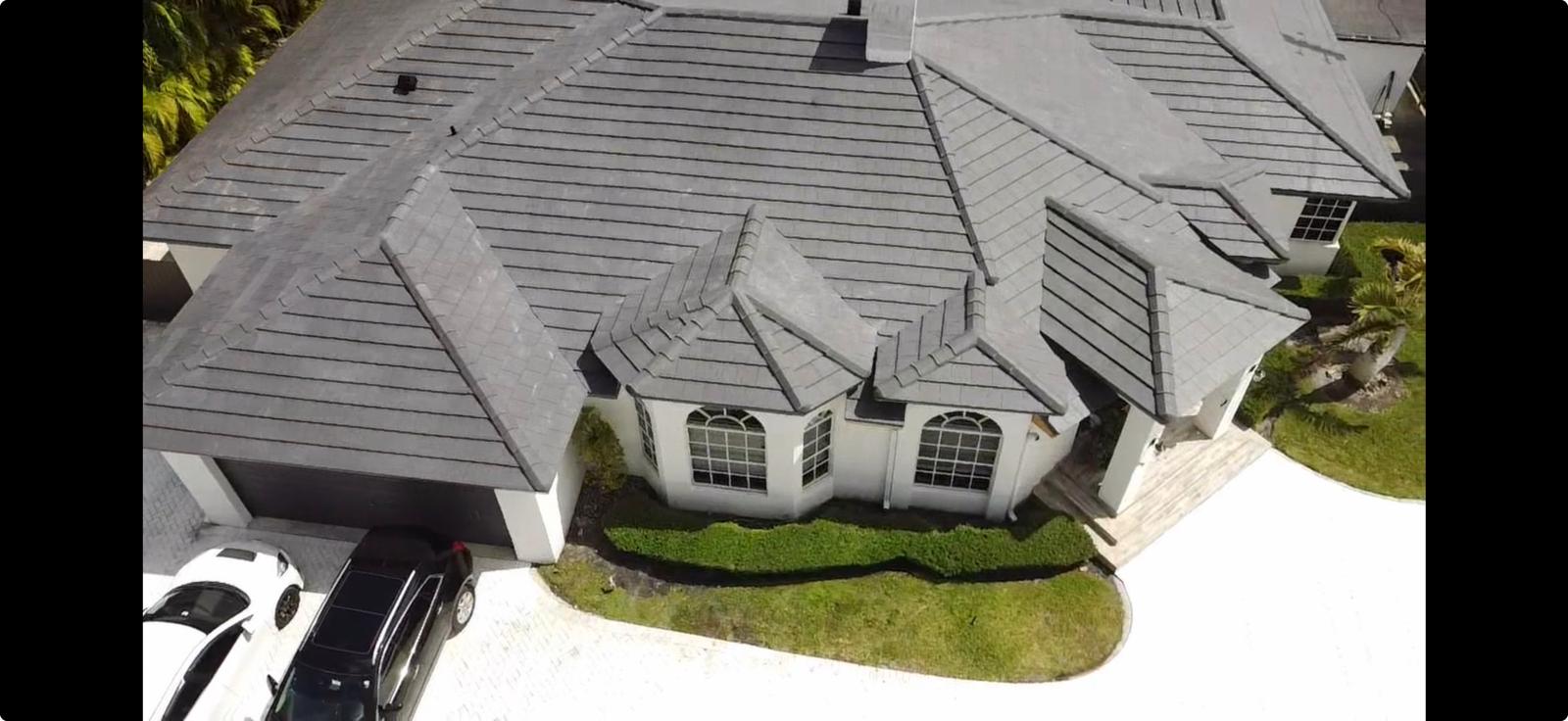 the roof of a building with snow on it