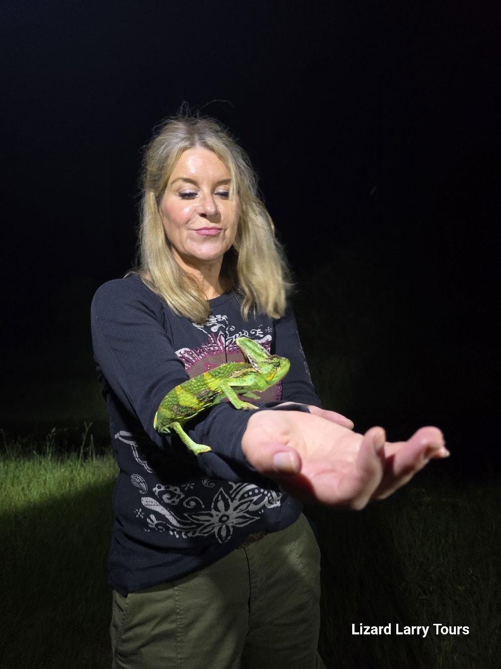 woman holding lizard