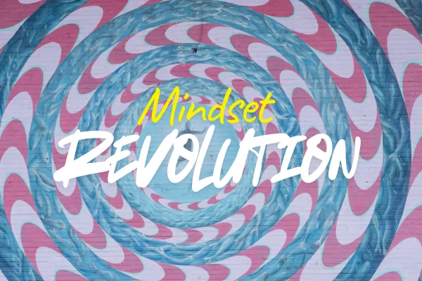 Mindset Revolution cover art with swirling vortex mural in pink and blue tones