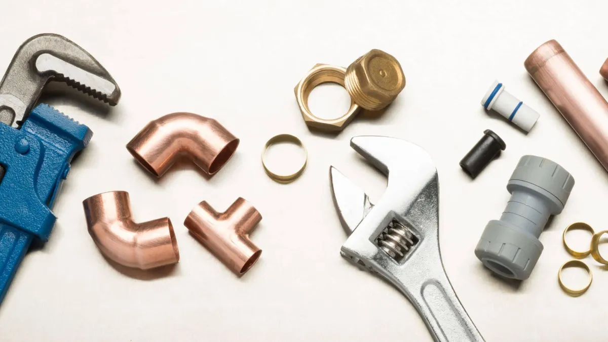 plumber wrench and pipe fittings