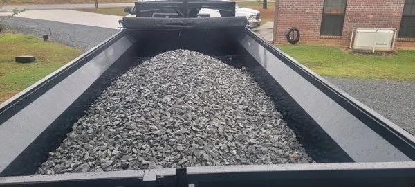 Dump trailer loaded with gravel ready for rock and gravel delivery
